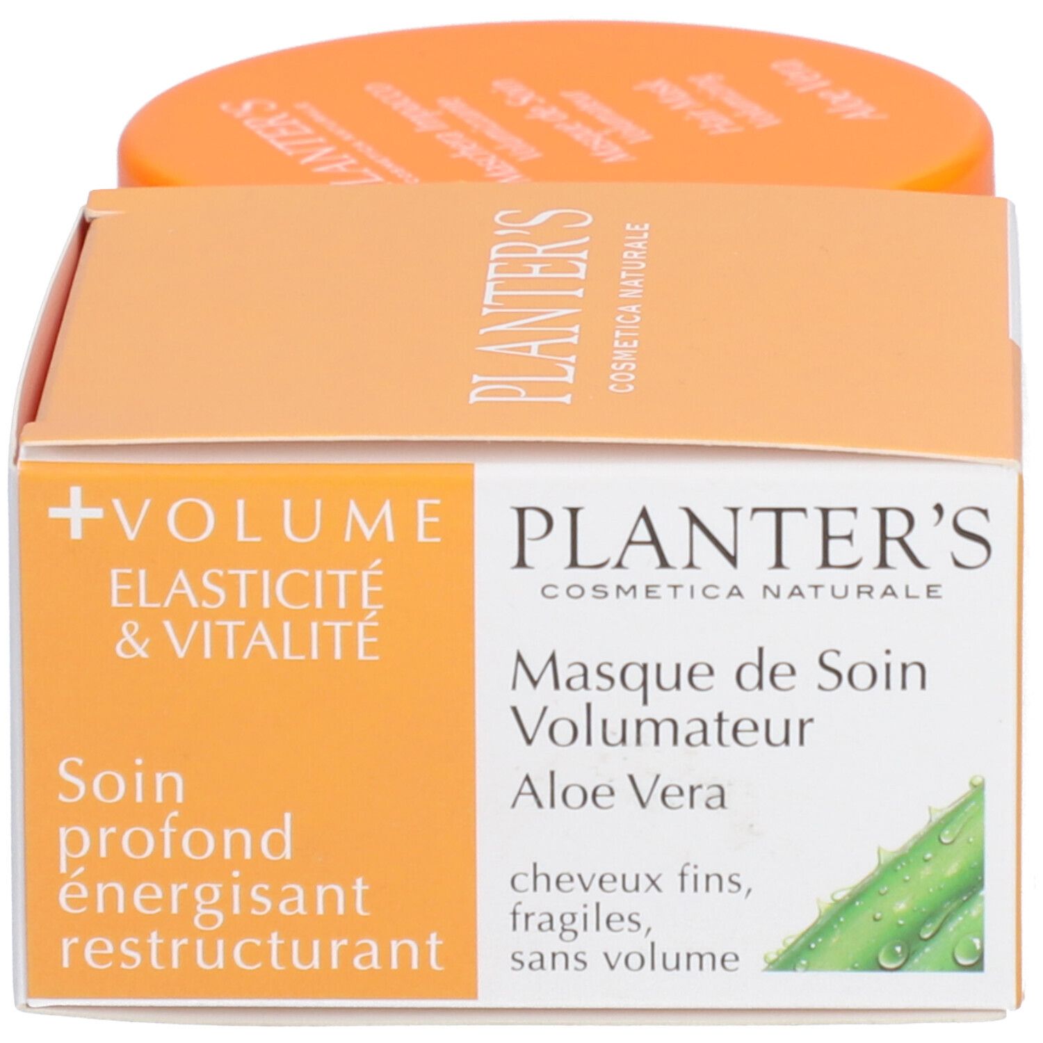 Emballage du produit. Inscription : Planter's Masque de Soin Volumateur Aloe Vera. Couvercle orange en arrière-plan.