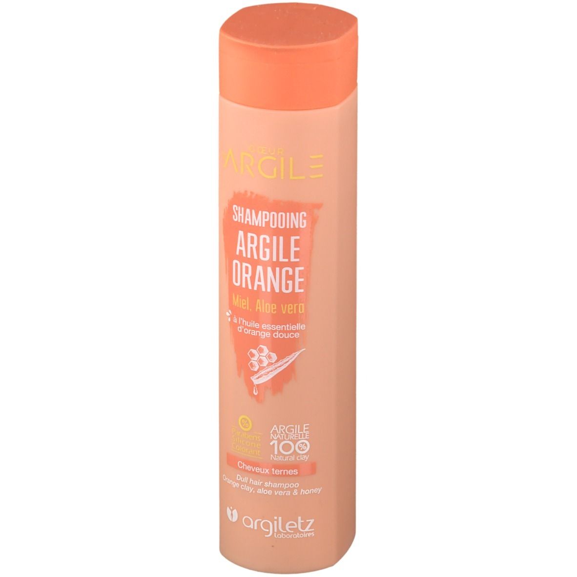 Flacon de shampooing beige et bouchon orange. Inscriptions: Argile Orange Shampoo, Miel, Aloe vera. Logo Argiletz.