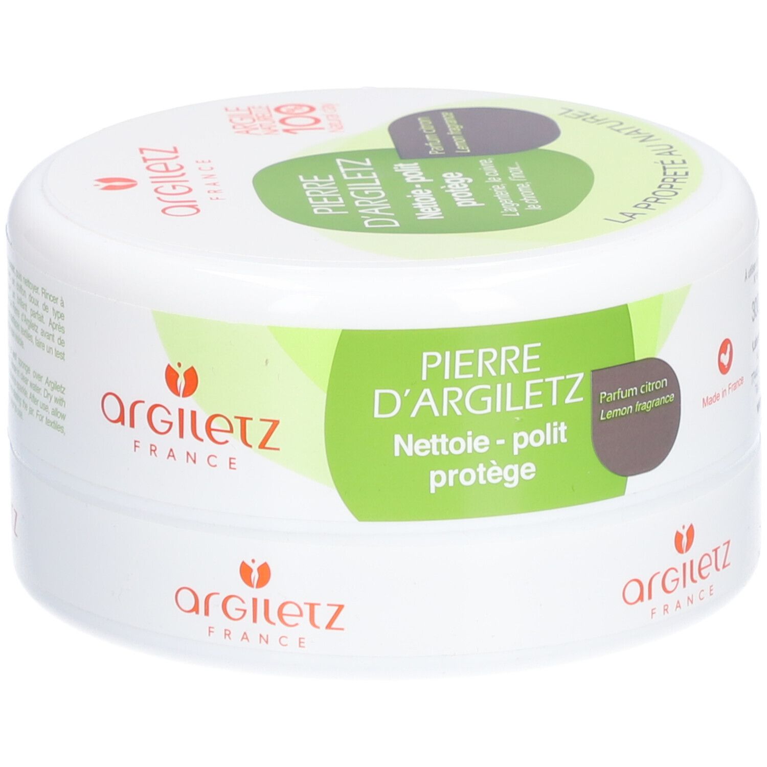 Weißer Behälter mit grünem Etikett. Aufschrift: Pierre d'Argiletz, Nettoie-polit protégé, Parfum citron. Marke Argiletz.