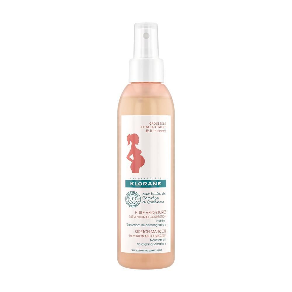 Klorane-Ölflasche mit Sprühkopf. Aufschrift: Schwangerschaft und Stillzeit. Logo mit schwangerer Frau. Produktname und weitere Informationen.