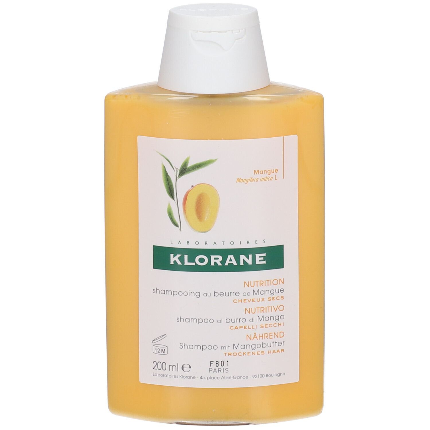 Flacon de shampooing jaune avec bouchon blanc. Inscription: Klorane, Mangue, shampooing pour cheveux secs.