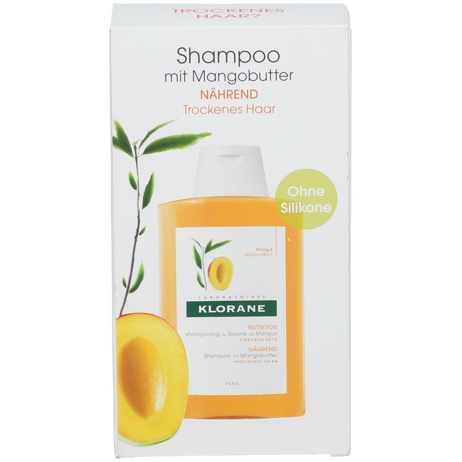Boîte avec flacon de shampooing. Inscription: Shampooing au beurre de mangue, Klorane, sans silicone. Illustration de mangue.