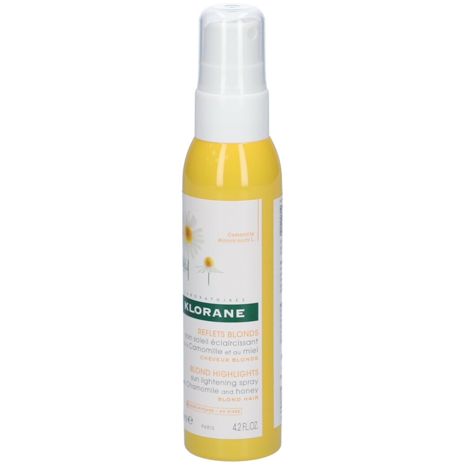 Flacon jaune avec vaporisateur blanc. Inscriptions: KLORANE, Reflets Blond, Blond Highlights. Camomille et miel.