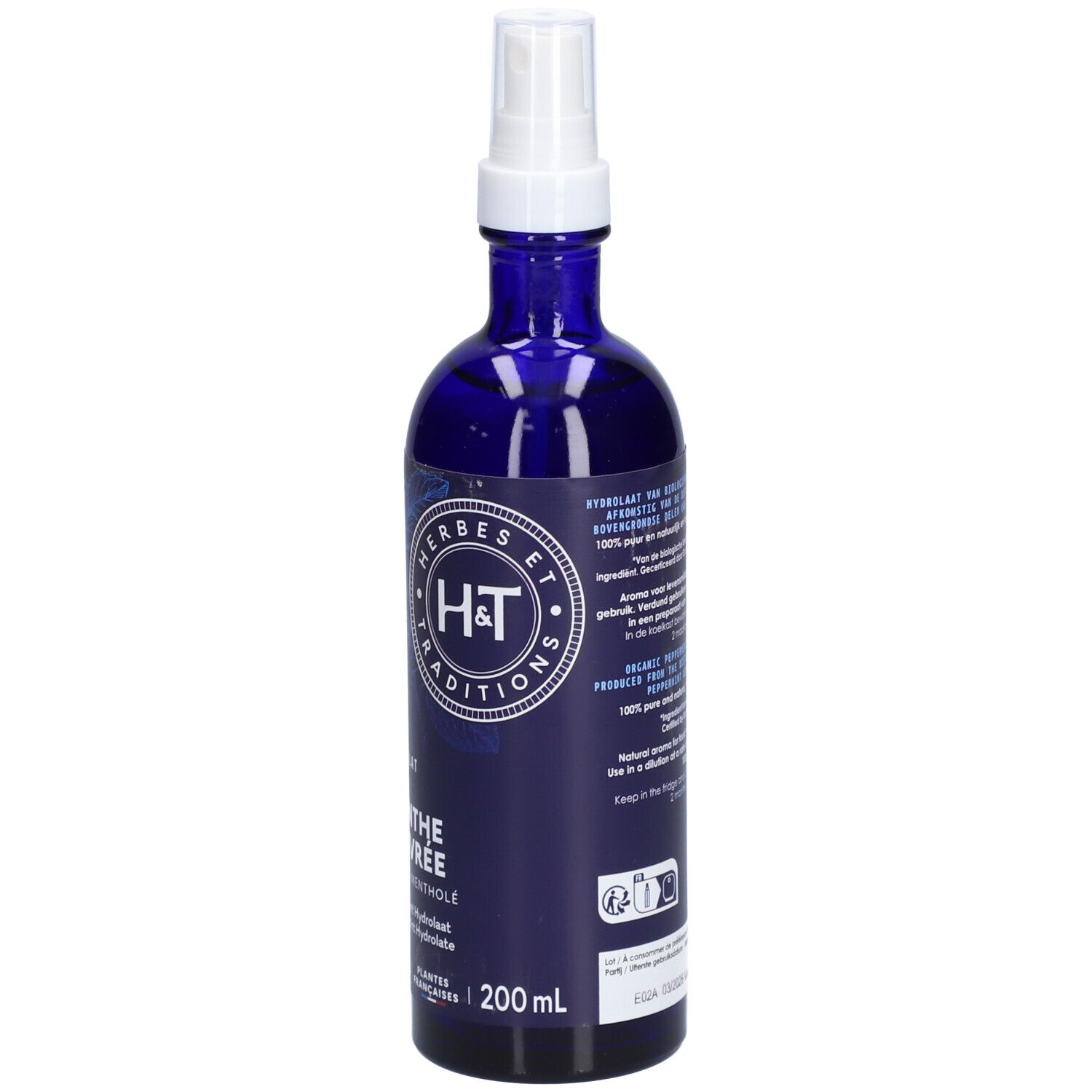Dos d'un flacon en verre bleu avec vaporisateur. Texte: ingrédients, utilisation, certification Bio.