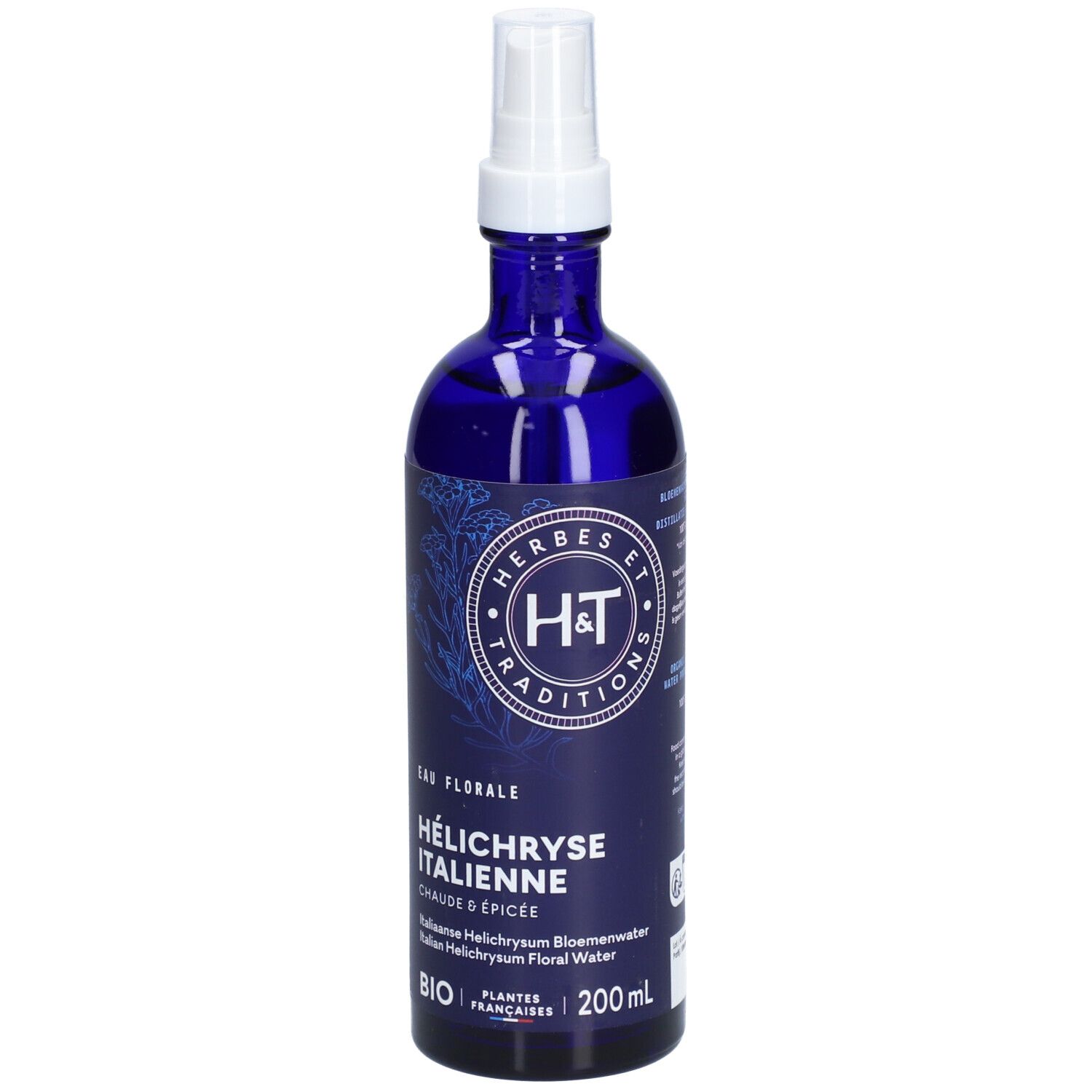Flacon en verre bleu avec vaporisateur. Étiquette avec texte: Hélihryse Italienne, BIO, 200 ml. Logo: H&T.