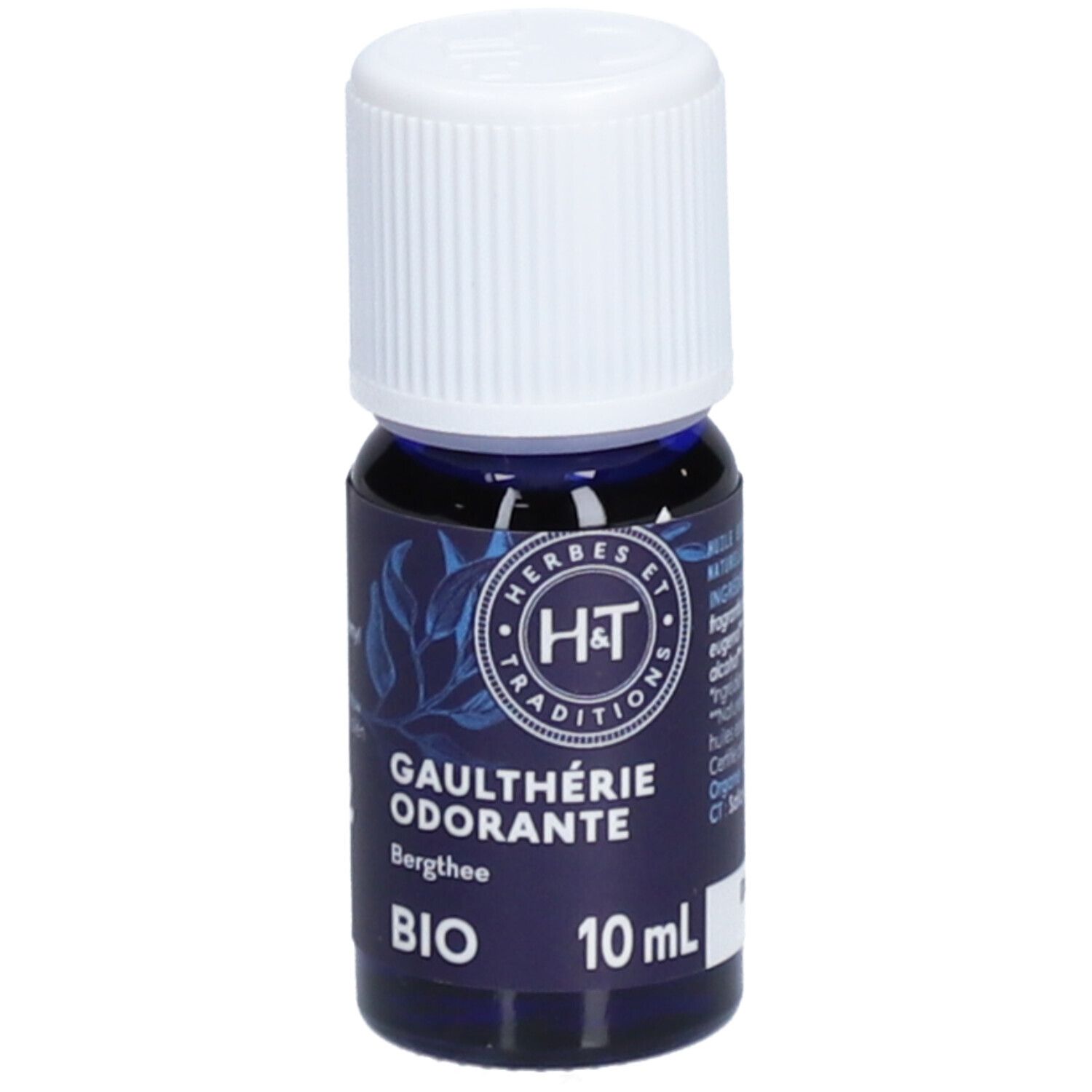 Flacon en verre bleu foncé avec bouchon blanc. Inscriptions: HERBES ET TRADITIONS, GAULTHÉRIE ODORANTE, BIO, 10 ml.