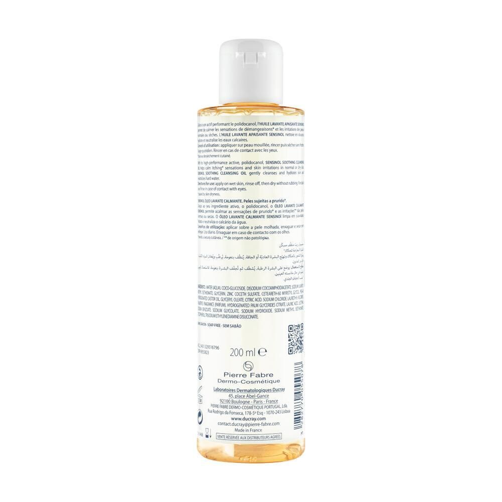 Rückseite der Flasche mit gelbem Öl. Text in mehreren Sprachen. Marke Ducray. 200 ml.
