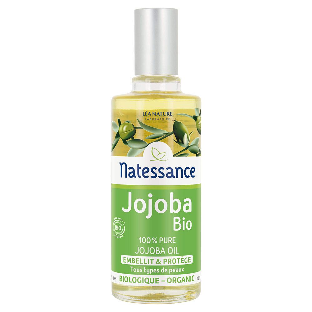Flacon en verre transparent, bouchon argenté. Étiquette "Natessance Jojoba Bio" et logo bio. Illustration d'olives.