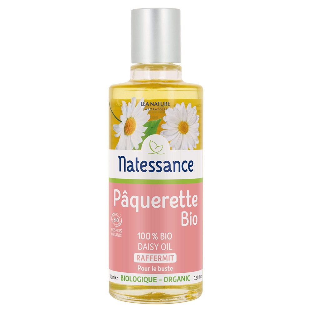 Flacon en verre transparent avec bouchon argenté. Étiquette avec nom du produit, illustration de marguerites et label bio.