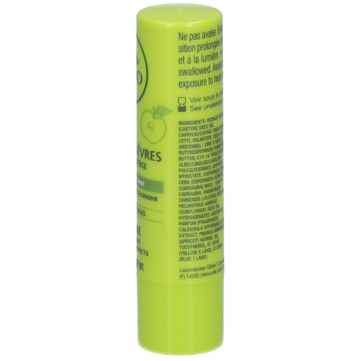 Stick de soin des lèvres vert clair. Dos avec ingrédients et avertissements. Texte en français.
