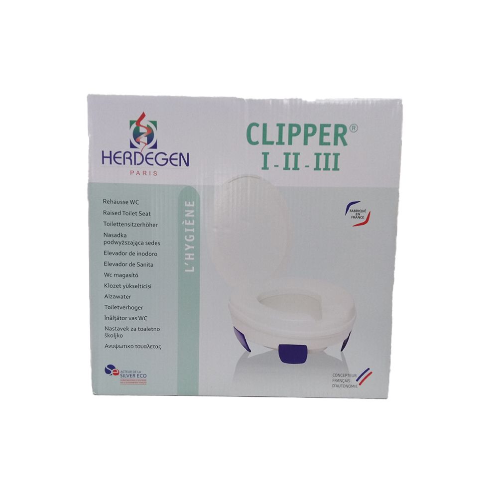 Emballage Clipper II. Siège de toilette blanc, accessoires bleus. Marque Herdegen Paris. Drapeau français.