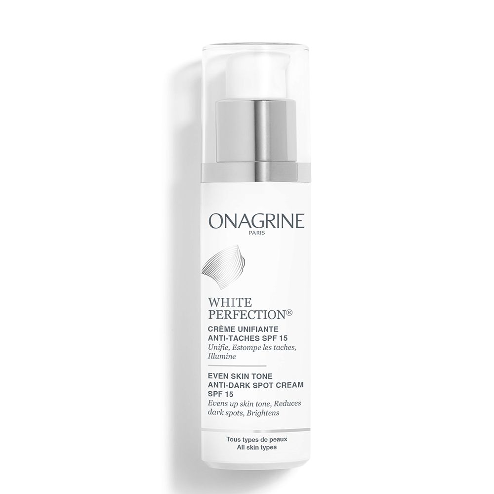 Flacon blanc avec pompe. Inscription: Onagrine, White Perfection, Crème Unifiante Anti-Taches SPF 15. Pour tous types de peaux.