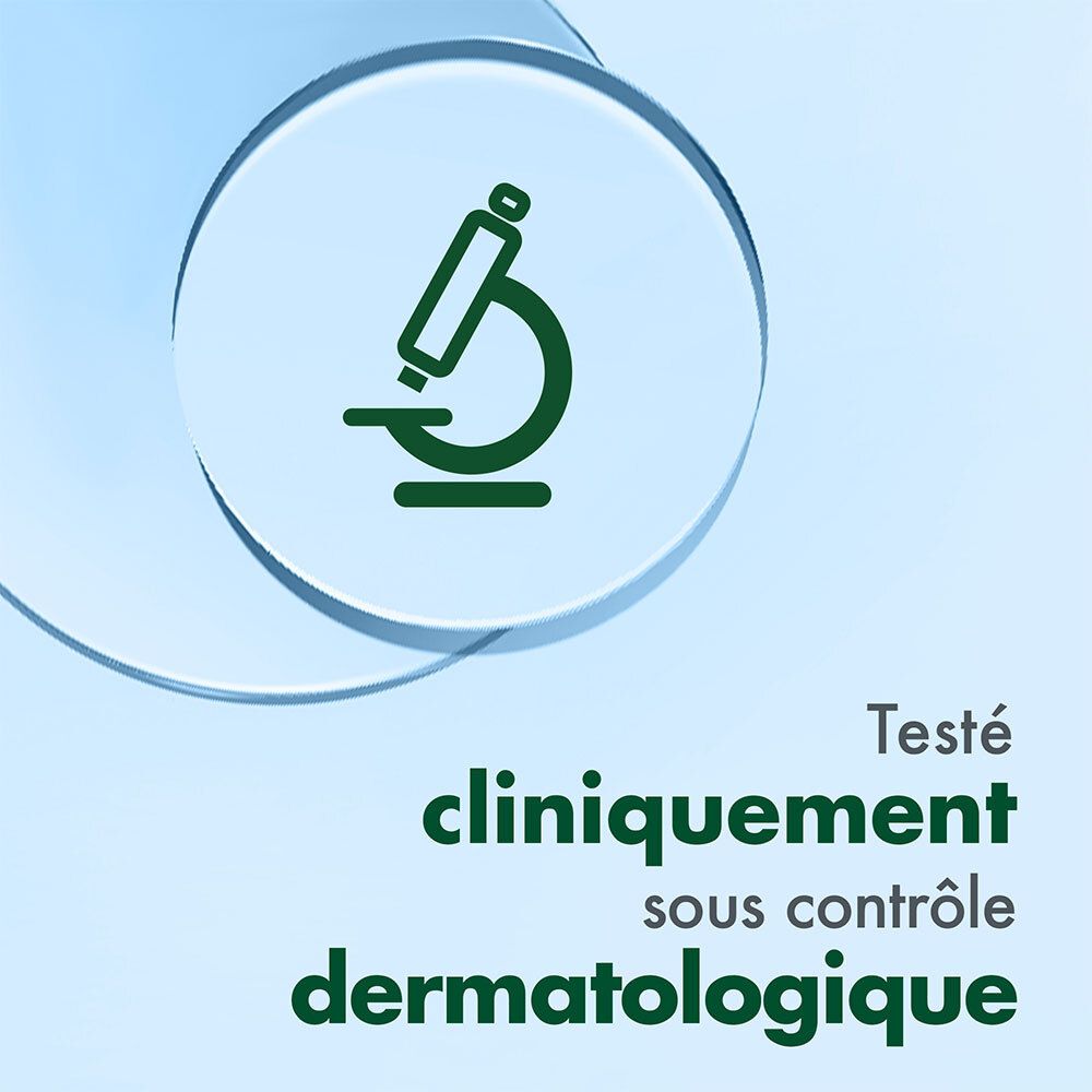 Symbole de microscope. Texte: Testé cliniquement sous contrôle dermatologique.