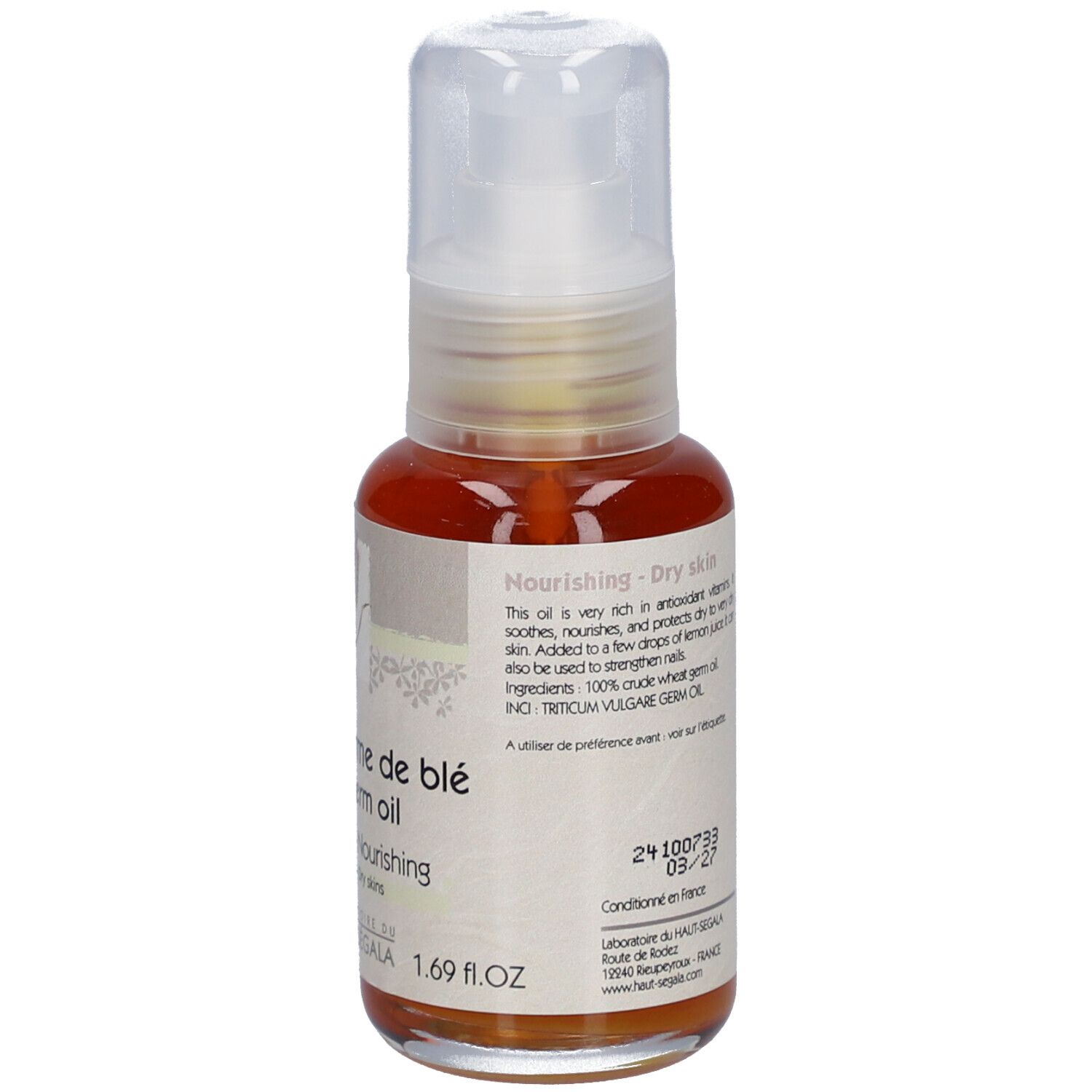 Weizenkeimöl-Flasche mit Pumpverschluss. Aufschrift: Huile de germe de blé, Wheat germ oil, Nourrissante, Peaux sèches. Laboratoire du Haut-Ségala.