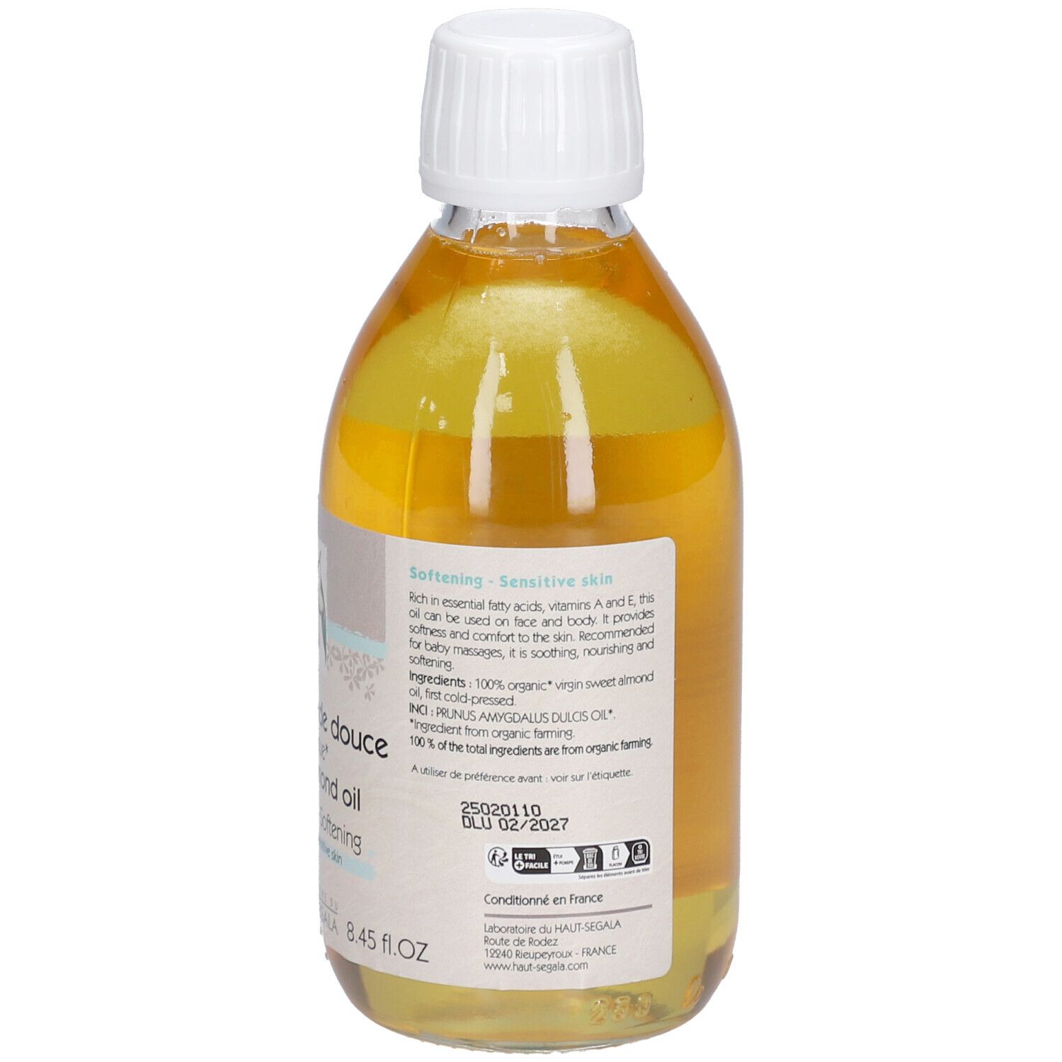 Vue arrière d'une bouteille avec contenu jaune. Étiquette avec texte. Bouchon blanc. Inscription: Huile d'amande douce biologique. Certification bio.