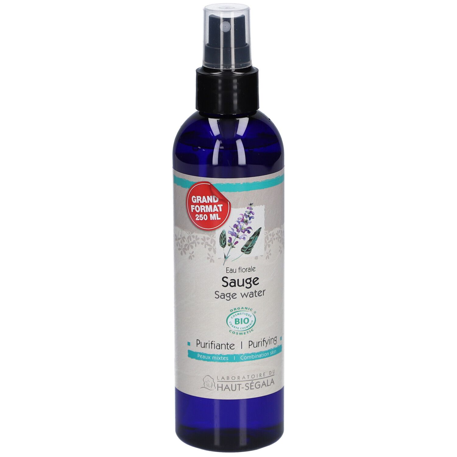 Blau-transparente Flasche mit schwarzem Sprühkopf. Etikett mit Produktnamen, Bio-Siegel und rotem Aufkleber.