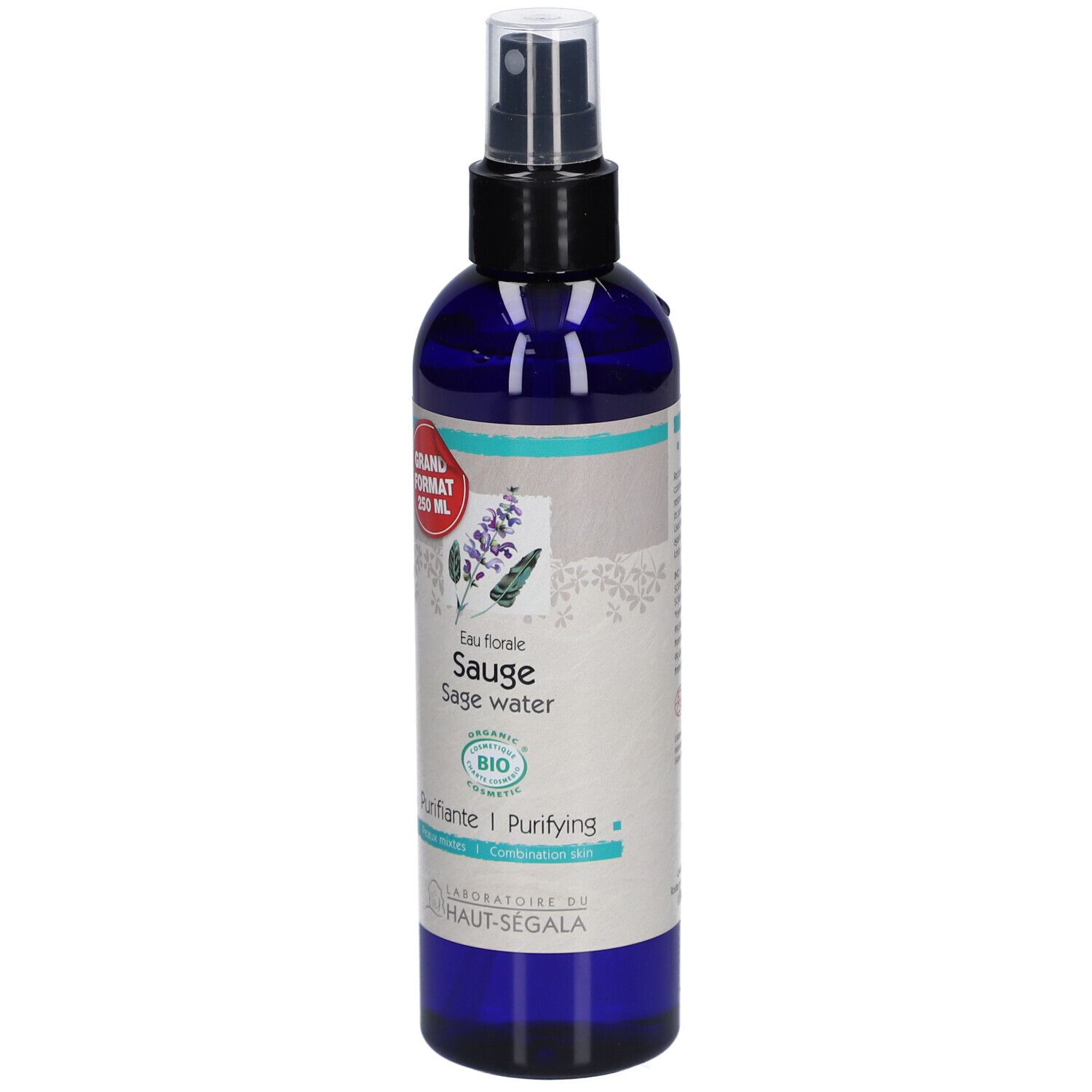 Blau-transparente Flasche mit schwarzem Sprühkopf. Etikett mit Produktnamen, Bio-Siegel und rotem Aufkleber.