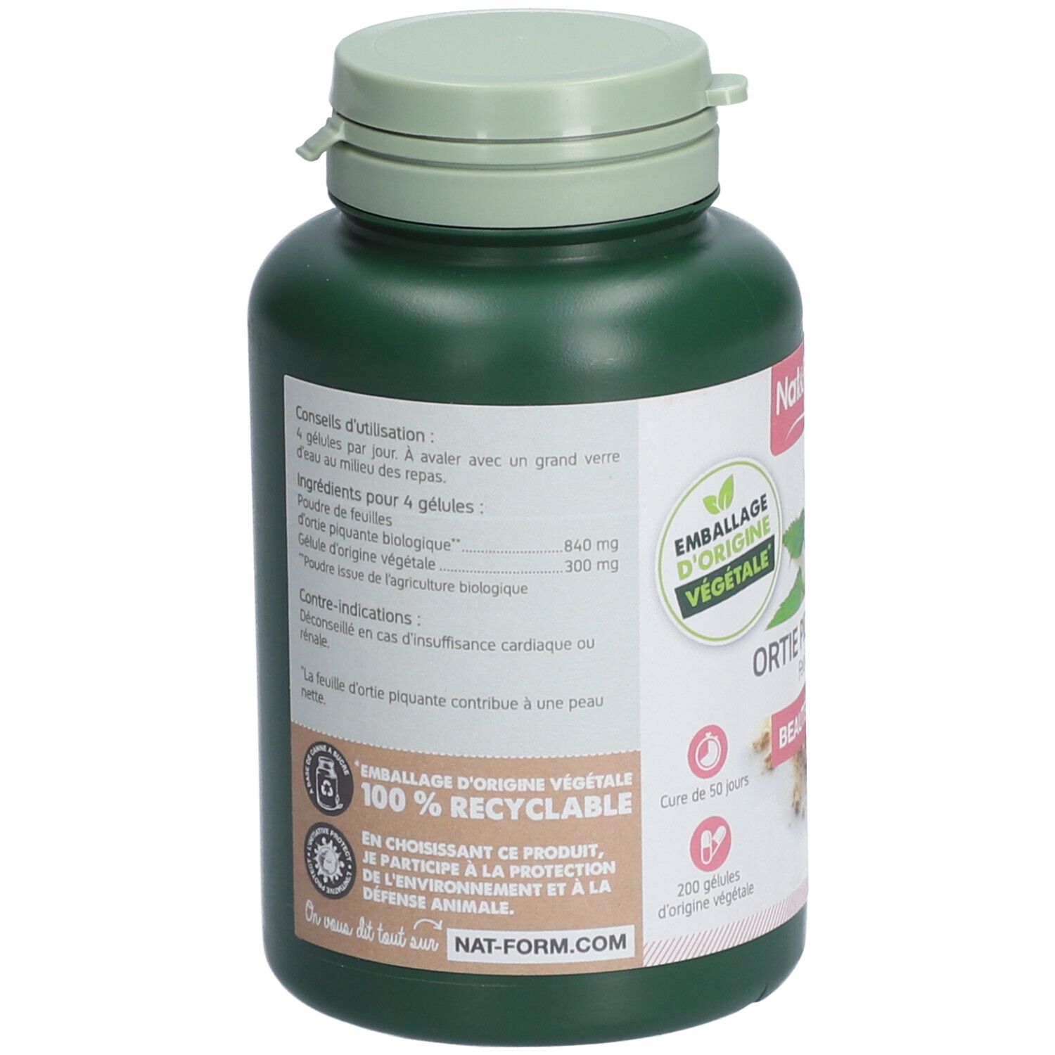 Rückseite der grünen Flasche. Etikett mit Informationen zu Inhaltsstoffen, Anwendungshinweisen und Recycling-Logo. Text in Französisch.