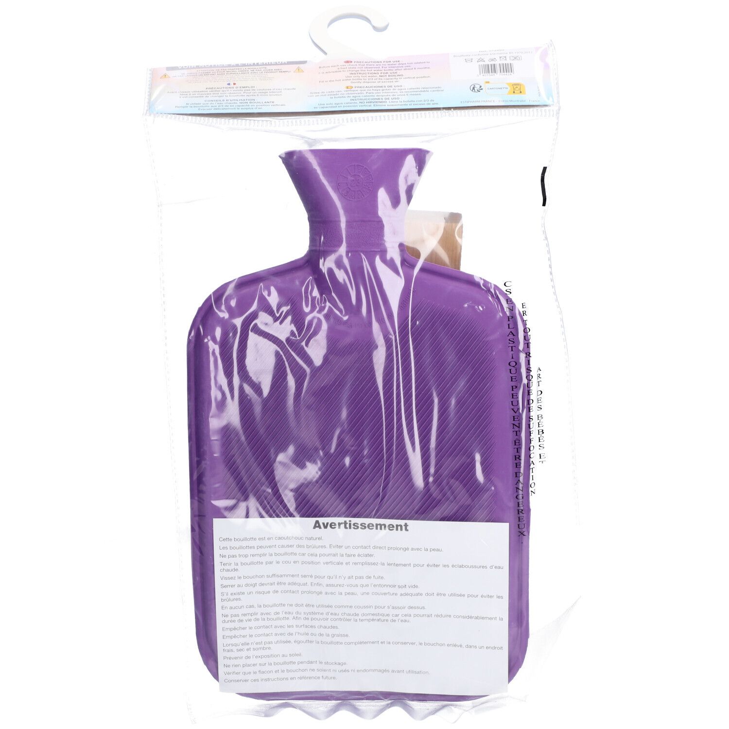 Dos de la bouillotte violette dans un emballage plastique. Texte : 'Avertissement'.