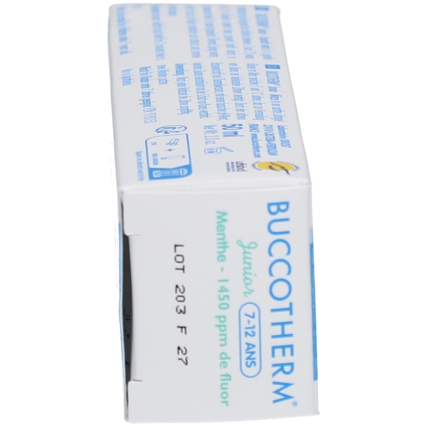Seite der Zahncreme-Schachtel. Losnummer und Mindesthaltbarkeitsdatum. BUCCOTHERM Junior.