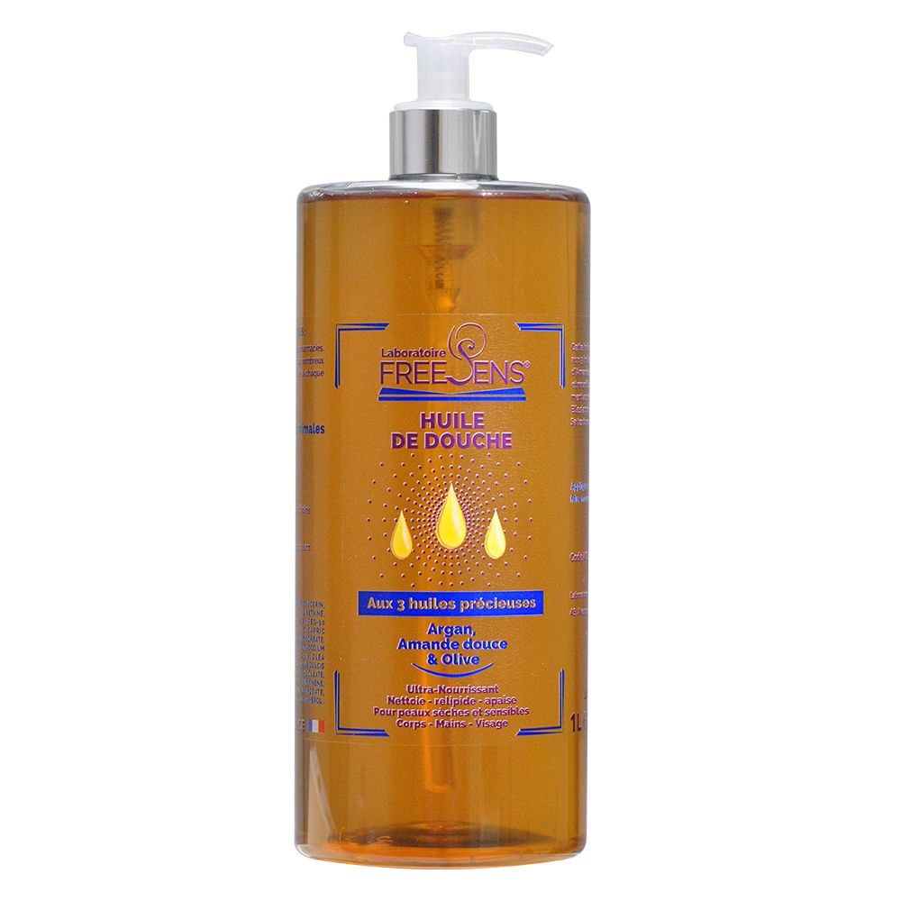 Freesens Huile de Douche, 3 huiles. Flacon transparent avec pompe. Huile de douche dorée. Inscriptions bleues et blanches.
