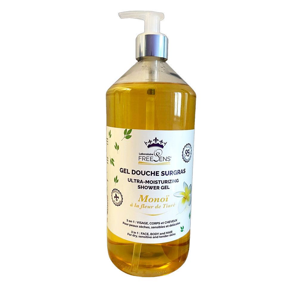 Flacon transparent de gel douche jaune. Inscription: Freesens Gel Douche Surgras. Avec pompe doseuse.