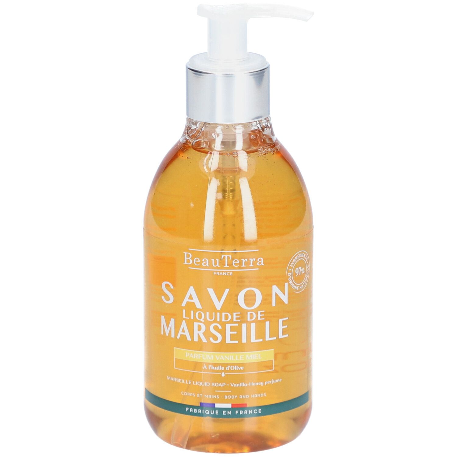 Vloeibare zeep in een transparante fles met pomp. Opschrift: Savon Liquide de Marseille, Vanille Miel. Gemaakt in Frankrijk.