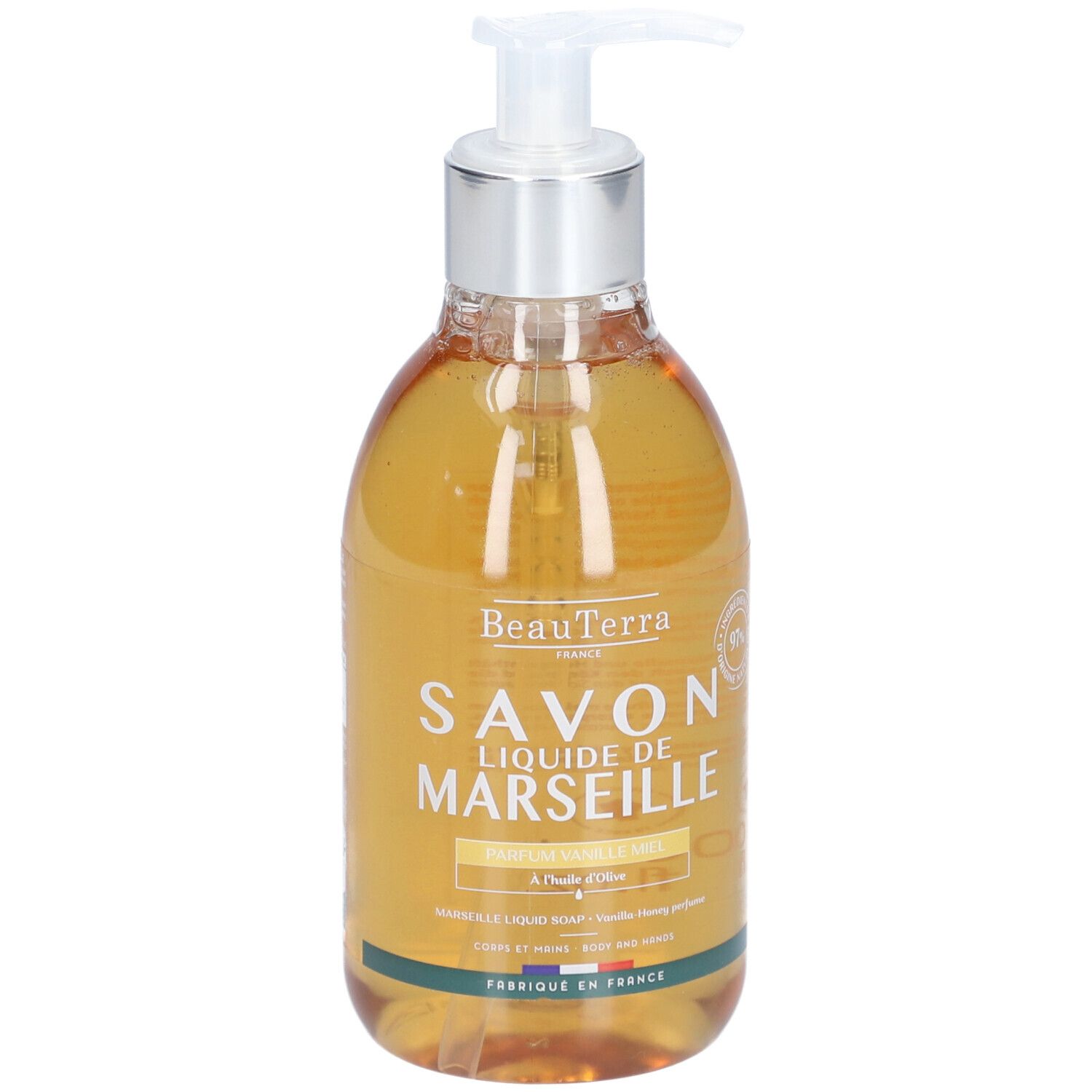 Vloeibare zeep in een transparante fles met pomp. Opschrift: Savon Liquide de Marseille, Vanille Miel. Gemaakt in Frankrijk.