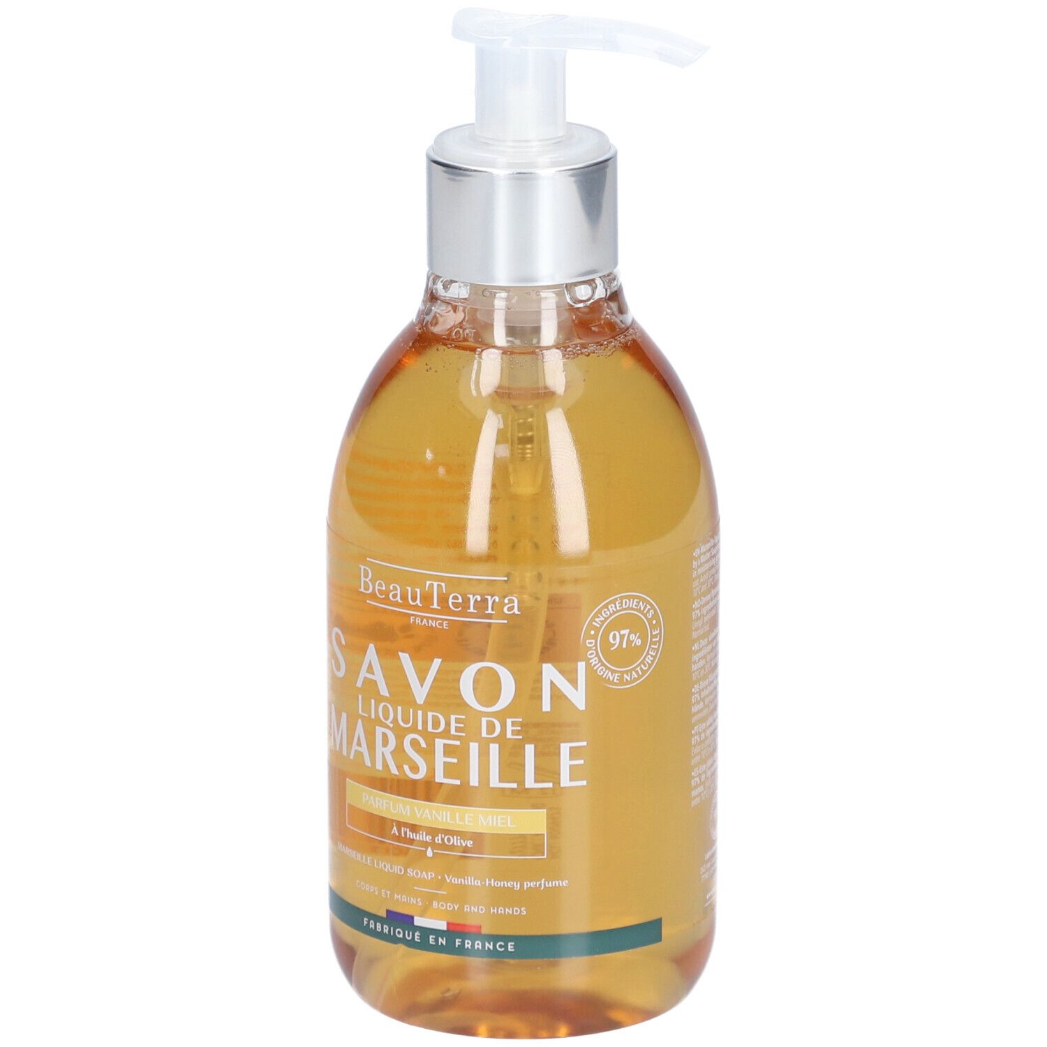 Vloeibare zeep in een transparante fles met pomp. Opschrift: Savon Liquide de Marseille, Vanille Miel. 97% ingrediënten van natuurlijke oorsprong.