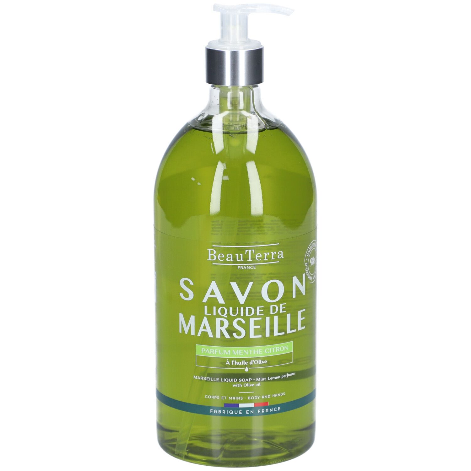 Savon liquide vert en flacon transparent avec pompe. Inscription: Savon Liquide de Marseille.