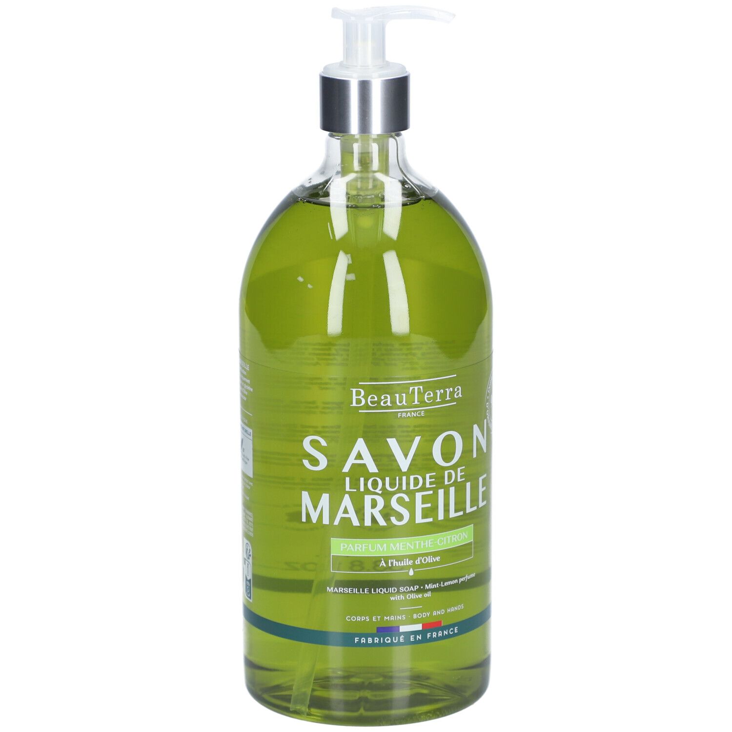 Savon liquide vert en flacon transparent avec pompe. Inscription: Savon Liquide de Marseille.