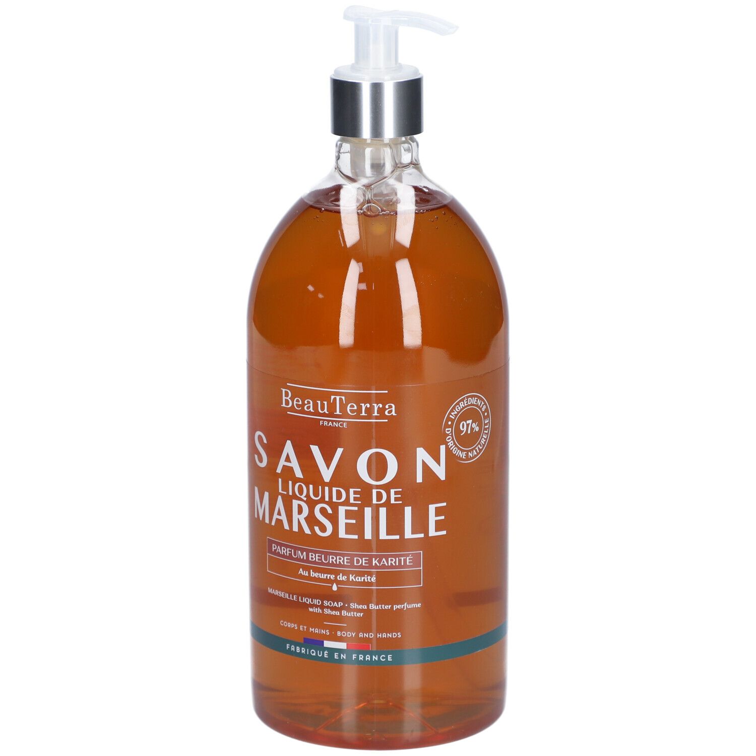 Flacon transparent de savon liquide. Inscription: Savon Liquide de Marseille, Parfum beurre de Karité. 97% ingrédients d'origine naturelle.