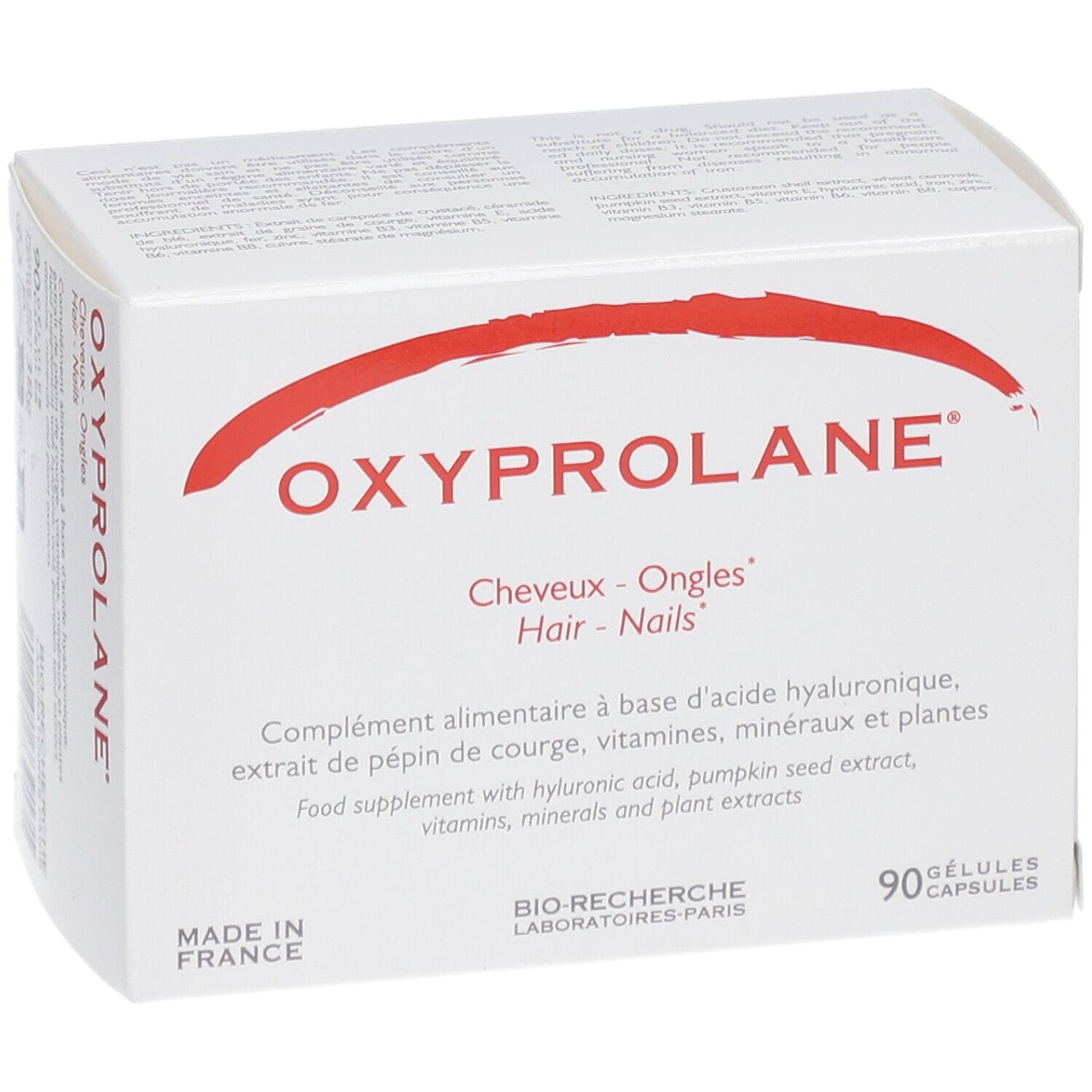 Boîte blanche avec arc rouge et texte. "OXYPROLANE" et "Cheveux - Ongles - Hair - Nails" sont visibles. 90 gélules.
