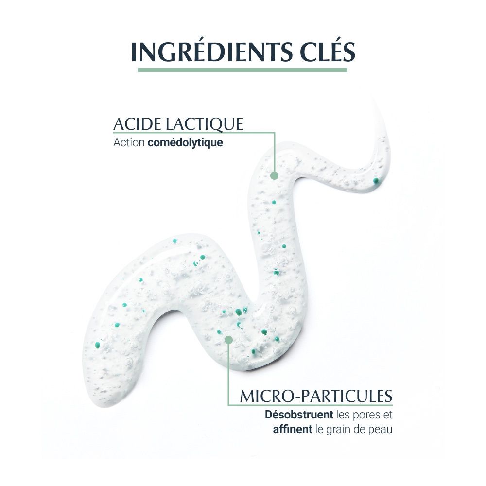 Texte: Acide lactique, Micro-particules. Texte: Désencombre les pores et affine le grain de peau. Gel avec particules vertes.