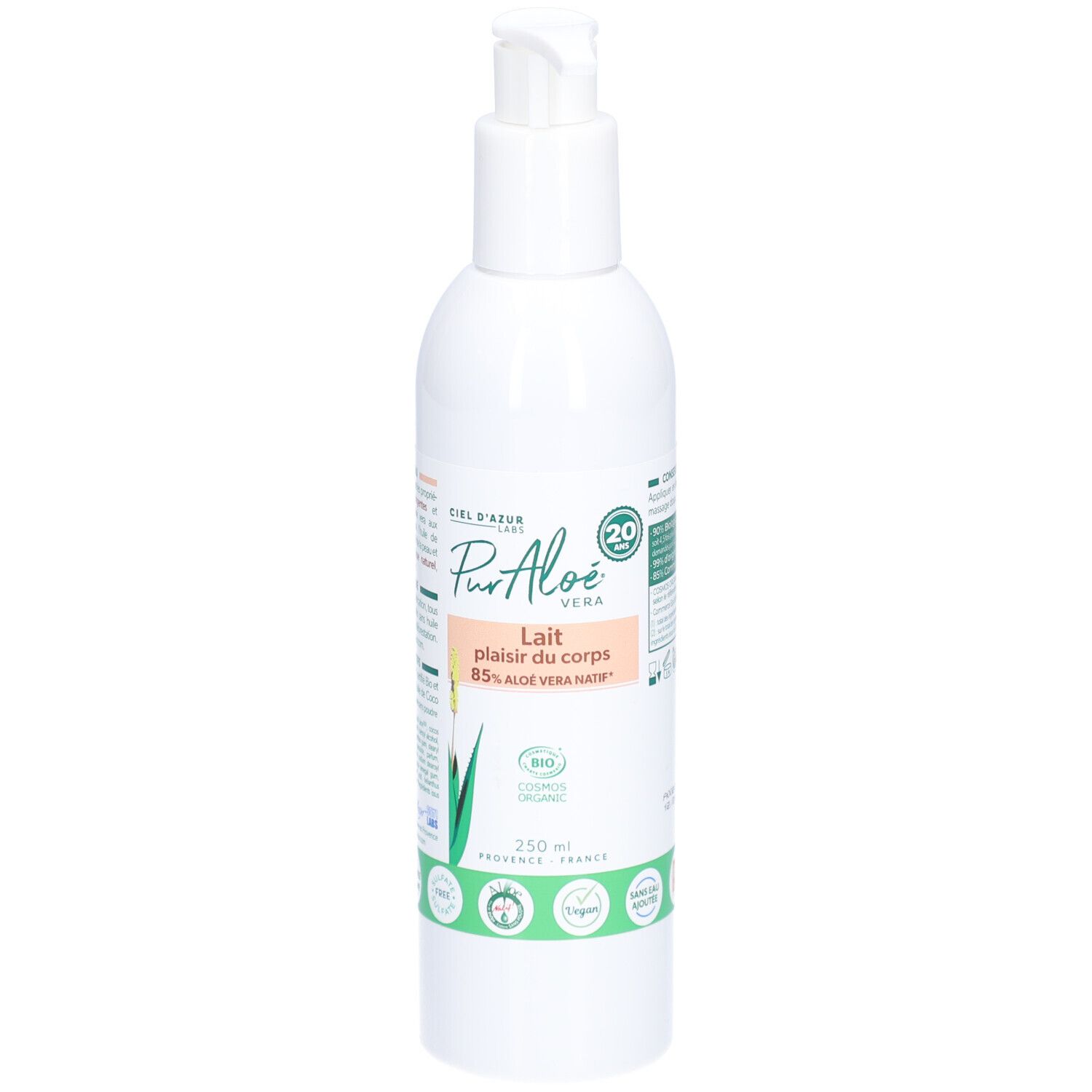 Flacon blanc avec pompe. Inscription: Pur Aloé Lait plaisir du corps 85% Aloe Vera Bio. Étiquette verte avec logo.