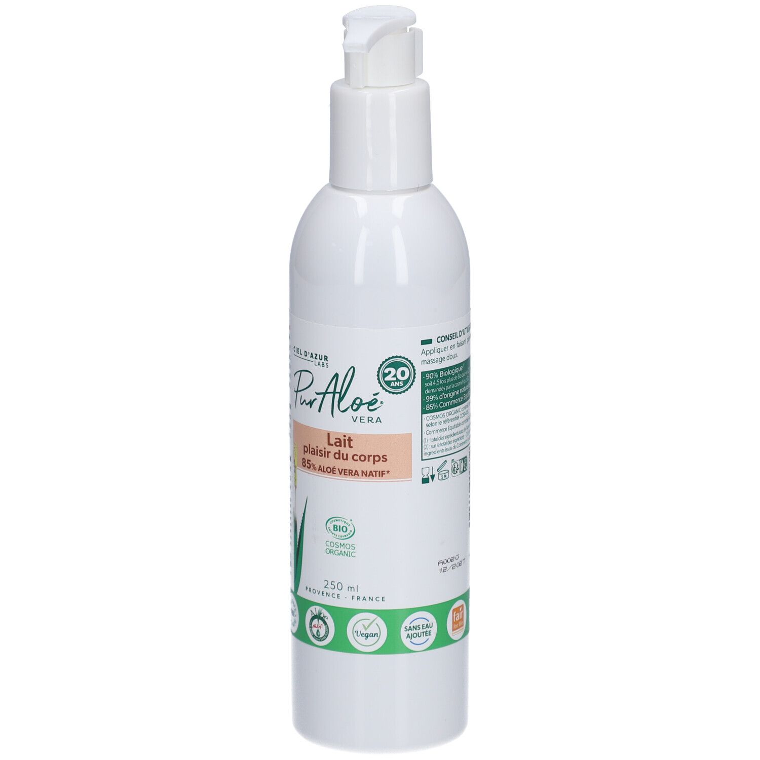 Flacon blanc avec pompe. Inscription: Pur Aloé Lait plaisir du corps 85% Aloe Vera Bio. Étiquette verte avec logo.