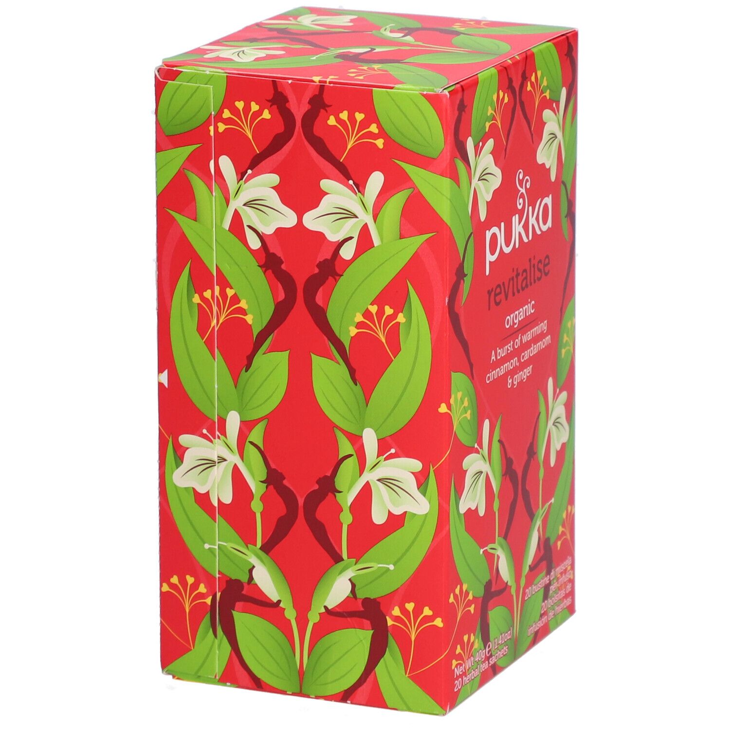Boîte rouge Pukka Revitalise. Motif floral. Inscription : A burst of warming cinnamon, cardamom & ginger. 20 sachets.