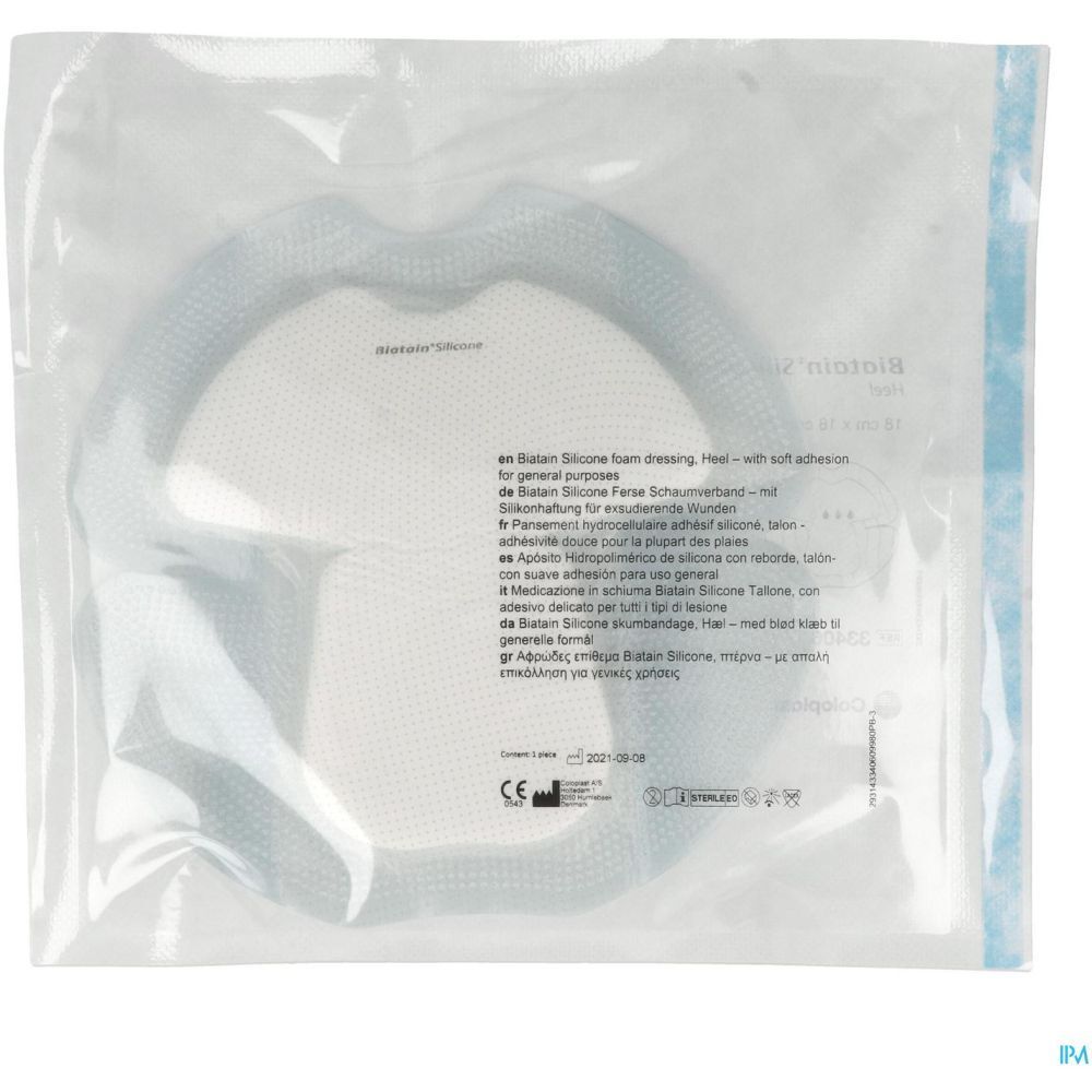 Emballage contenant un pansement Biatain® Silicone pour le talon. Le pansement est visible à l'intérieur.