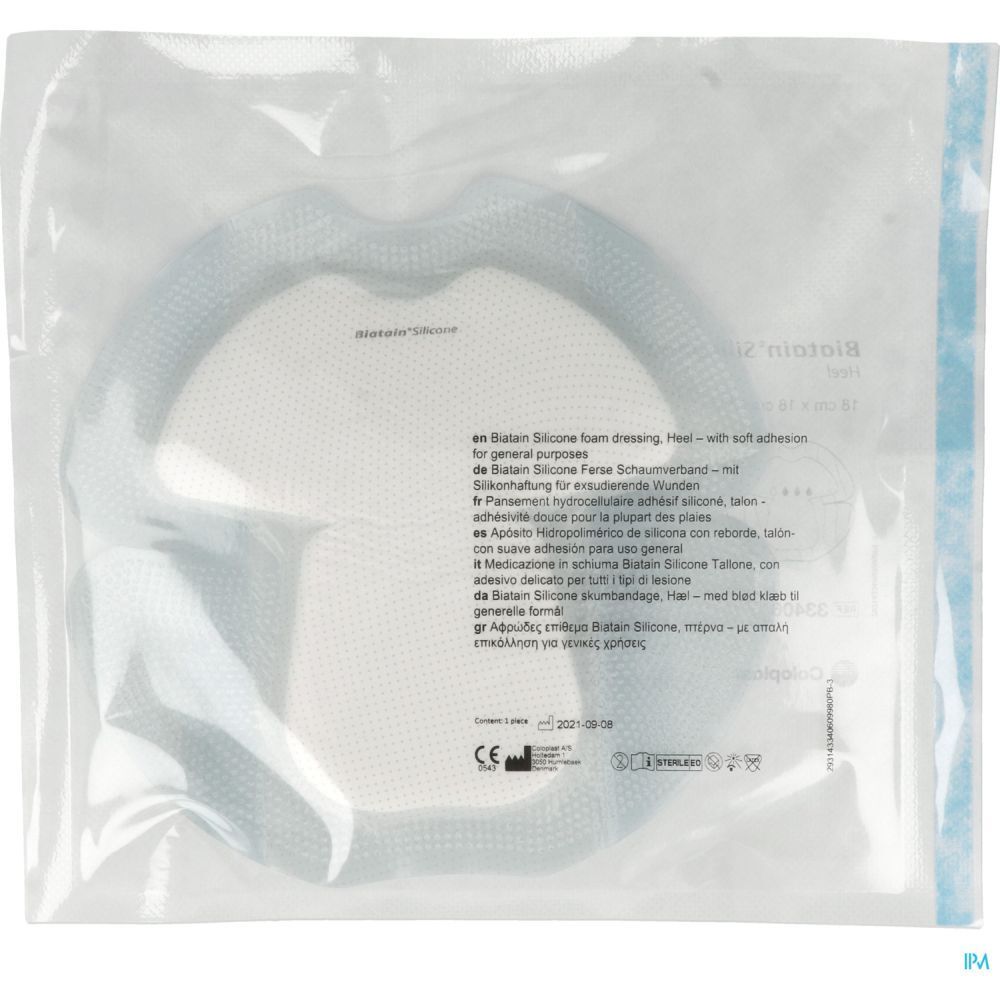 Emballage contenant un pansement Biatain® Silicone pour le talon. Le pansement est visible à l'intérieur.
