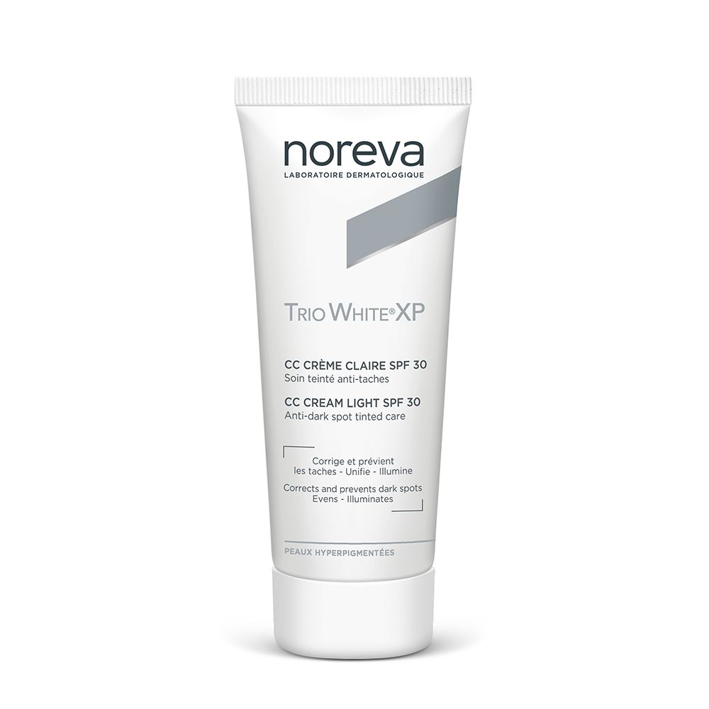 Witte crème tube. Merk Noreva. Tekst: Trio White XP CC Crème Claire SPF 30. Franse en Engelse tekst.