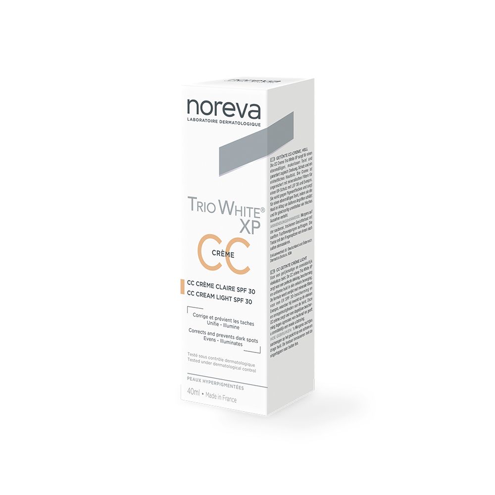 Witte doos. Merk Noreva. Tekst: Trio White XP CC Crème Claire SPF 30. Franse en Engelse tekst. 40ml.