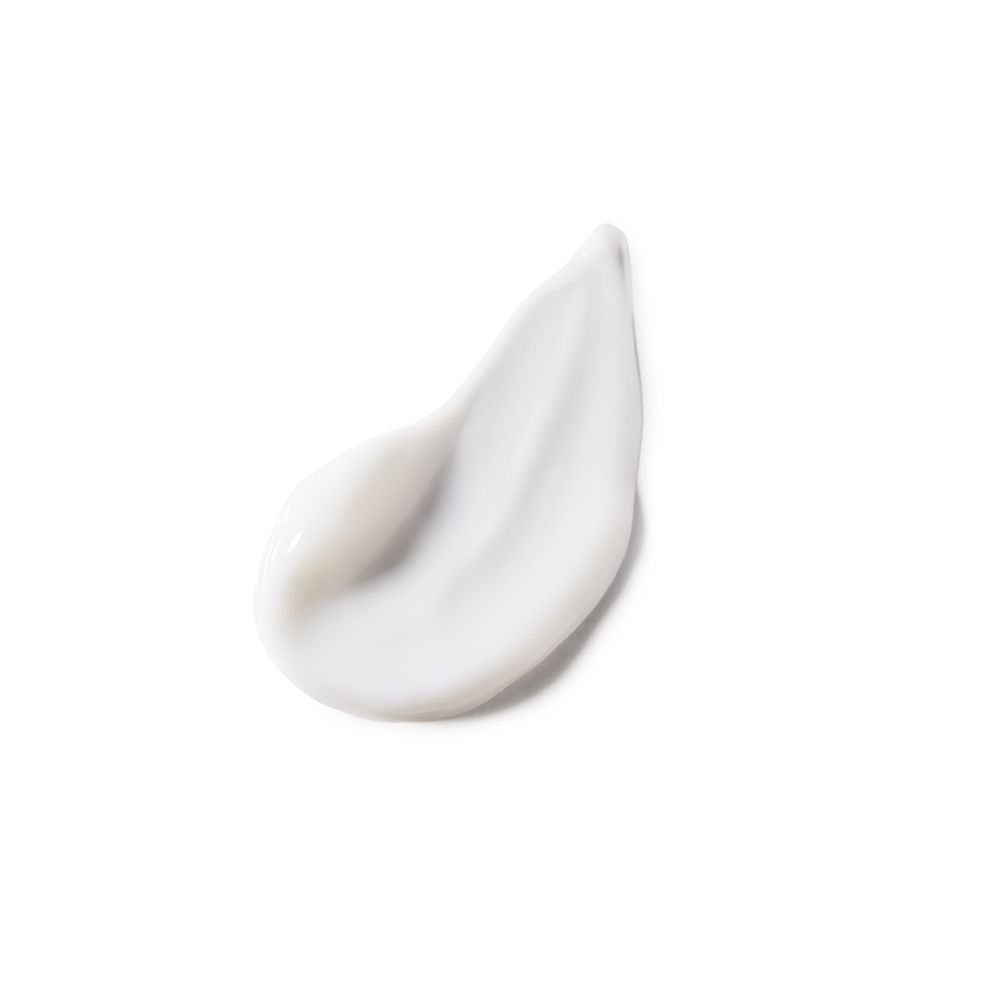 Klecks weißer Creme auf weißem Hintergrund. Glatte Textur. Keine weitere Beschreibung möglich.
