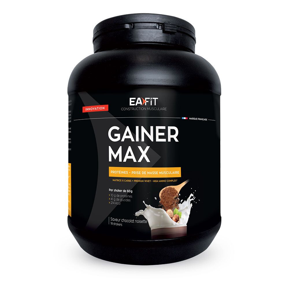 Schwarzer Behälter mit EAFIT Gainer Max. Aufdruck: Gainer Max, Schoko-Haselnuss. Abbildung mit Milch und Haselnüssen.