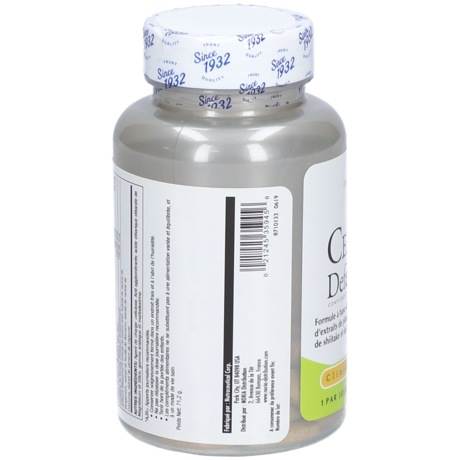 Vue arrière d'un flacon cylindrique. Inscription: CELL Defense. Contient des informations sur les ingrédients et les valeurs nutritionnelles.