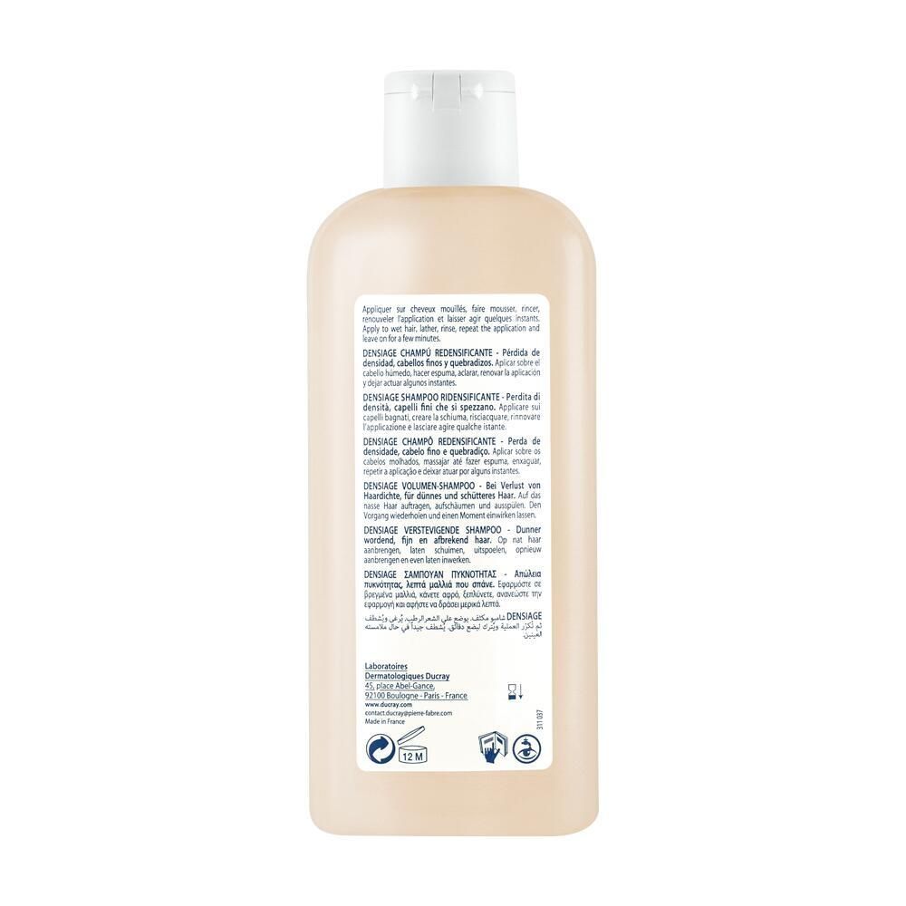 Rückseite einer beigen Shampoo-Flasche. Mehrsprachiger Text. Informationen zu Inhaltsstoffen und Anwendung.
