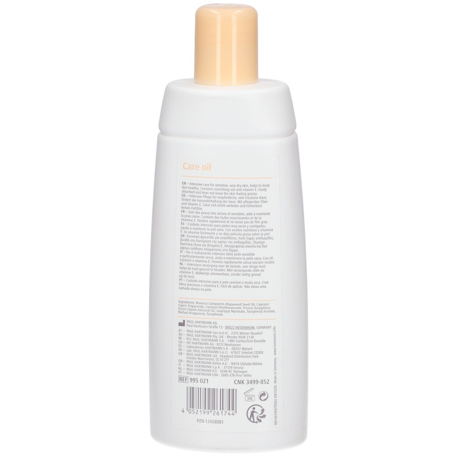 Dos d'un flacon blanc avec bouchon beige. Texte en plusieurs langues.