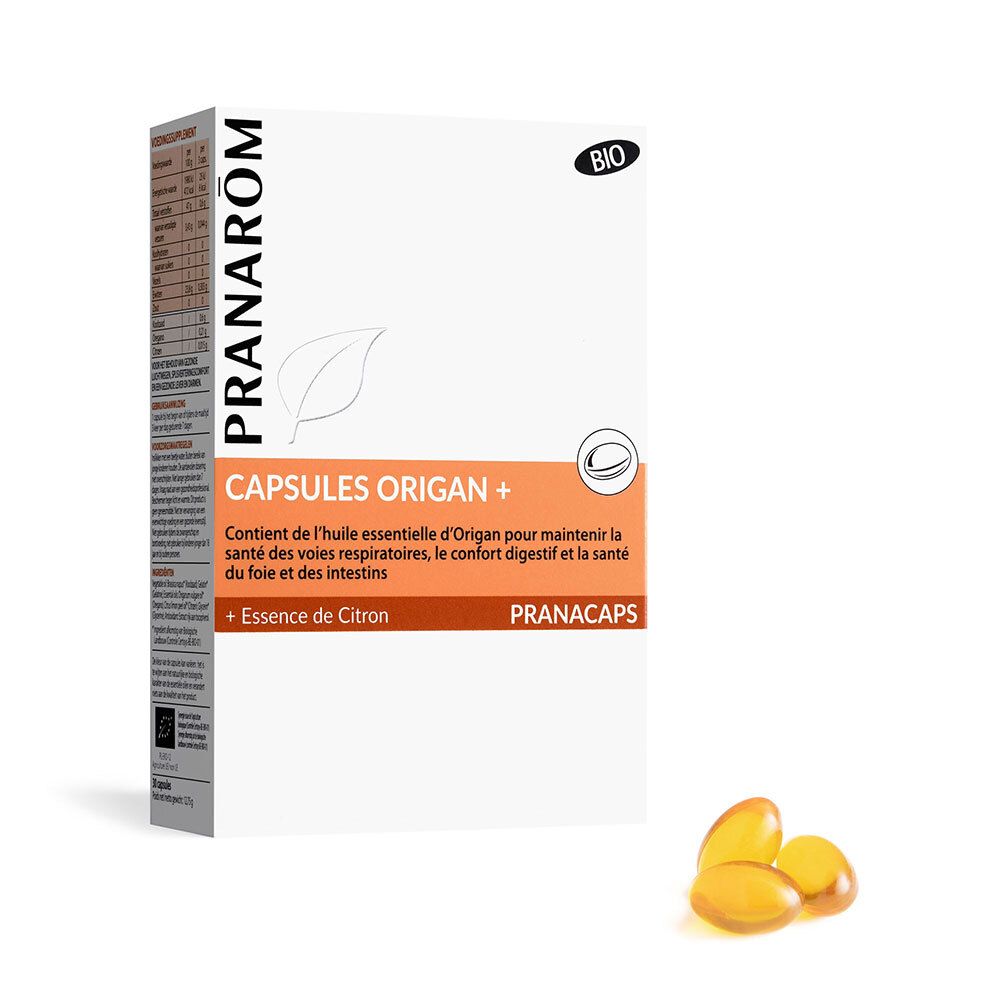 Boîte de capsules Pranarôm. Inscriptions: Capsules Origan +, Essence de Citron, Pranacaps. Quelques gélules sont visibles.