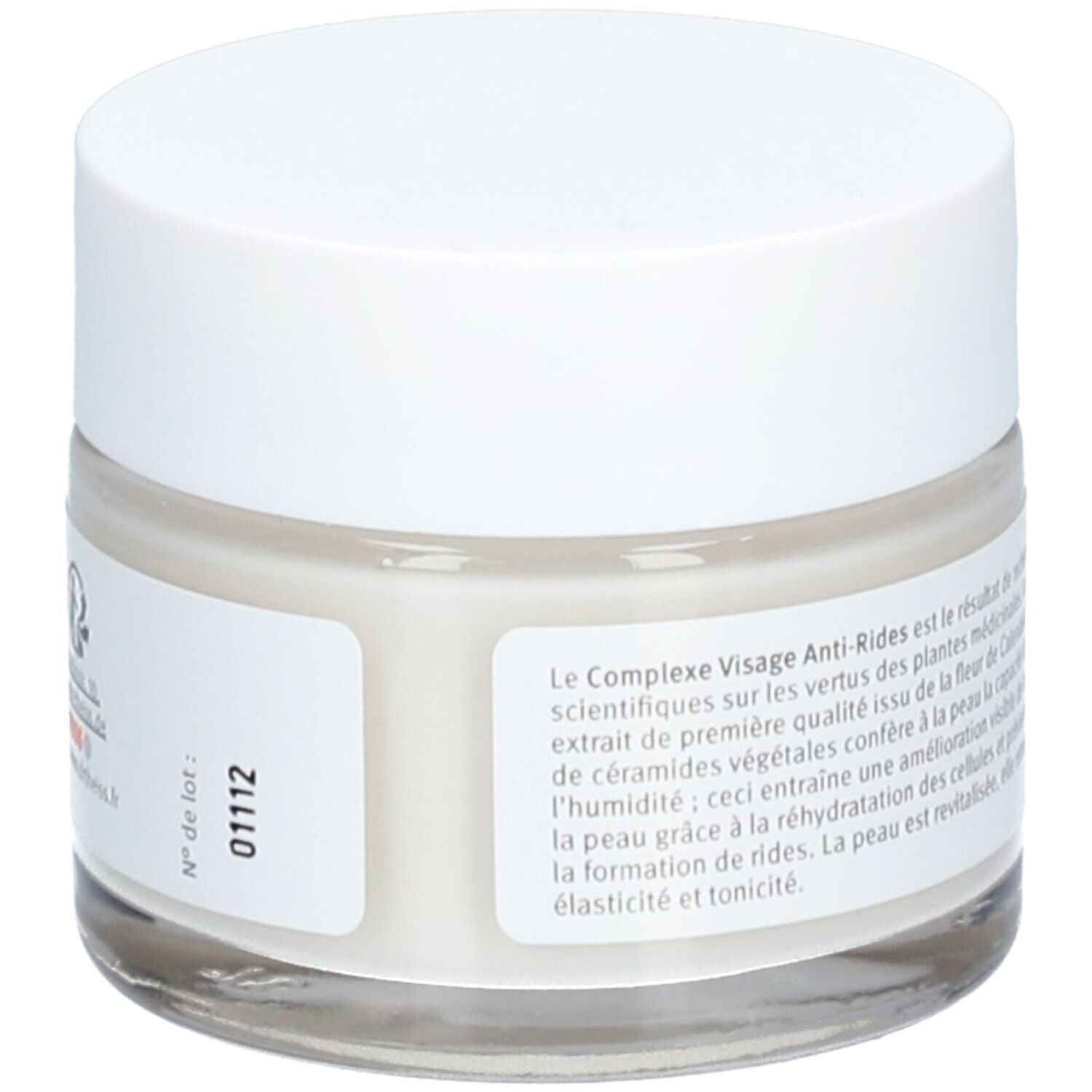 Pot de crème avec couvercle blanc. Étiquette : texte sur les effets. Sans nom de produit ni marque.