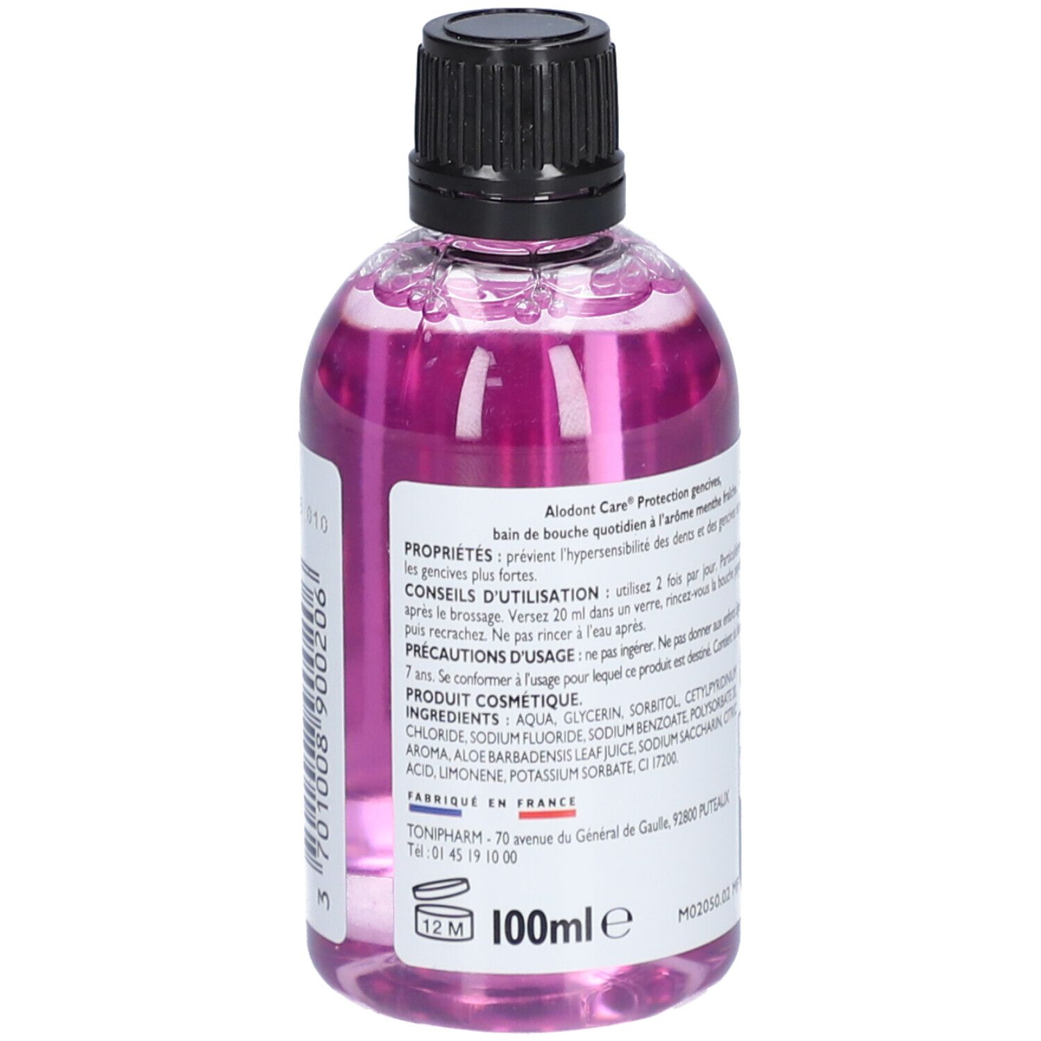 Achterkant van de mondspoelfles. Bevat informatie over ingrediënten en gebruik. Fles met zwarte dop.