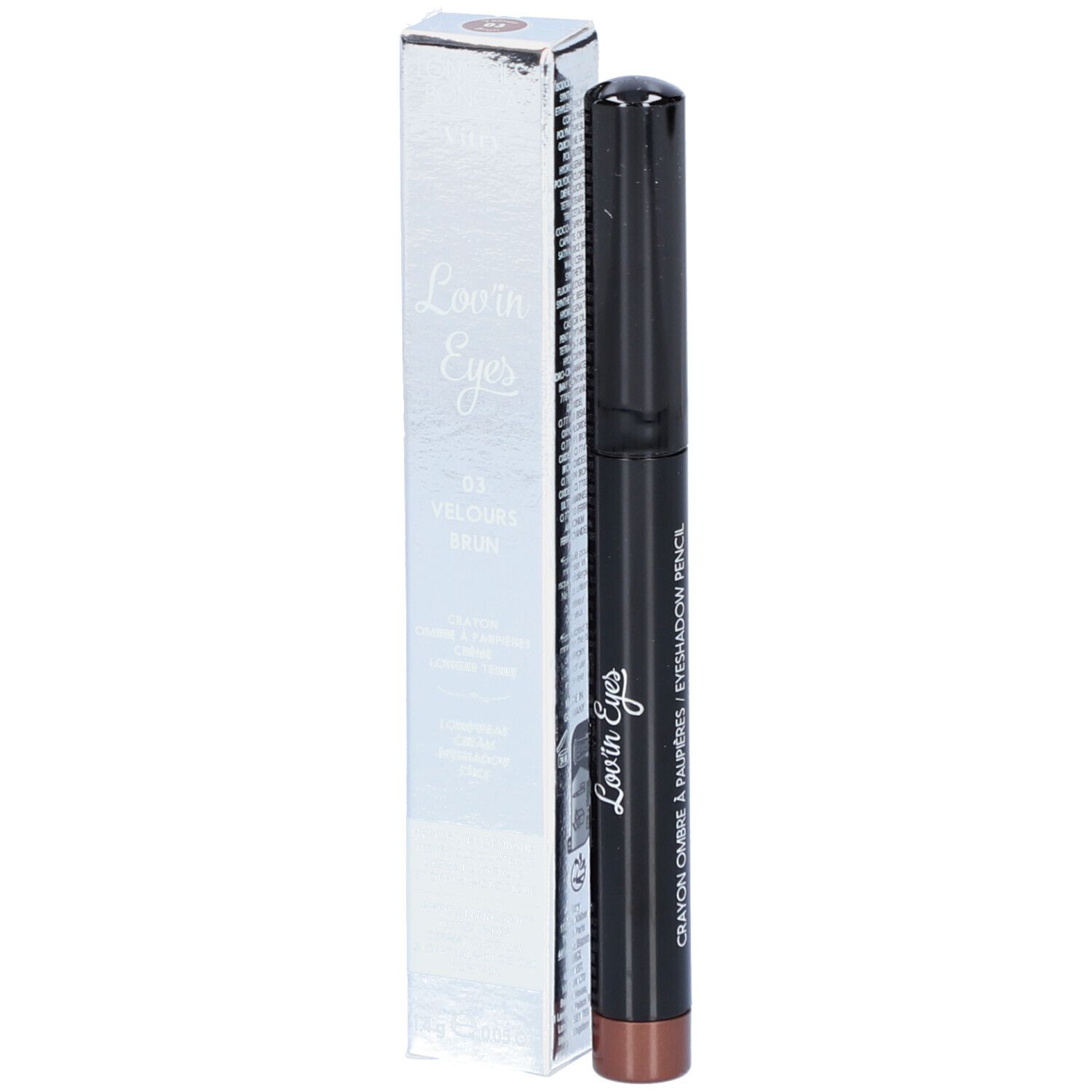 Crayon ombre à paupières marron et boîte. La boîte indique "Lovin' Eyes" et "03 Velours Brun".